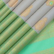 creamy sandal silver gold zari double peacock butta rexona green gold zari High border traditional silk saree