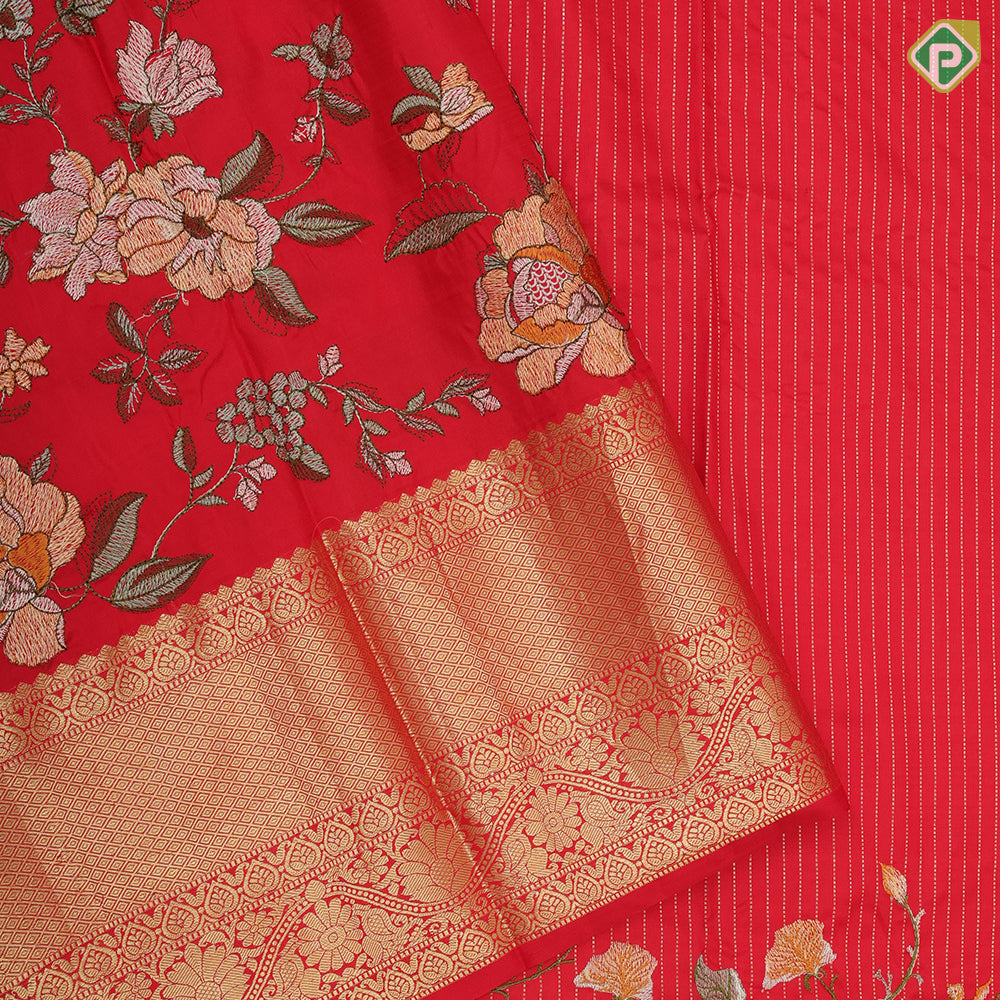 Chilly red silver gold zari stipes and four side floral embroidered self silver gold zari zig zag line border embroidery silk saree