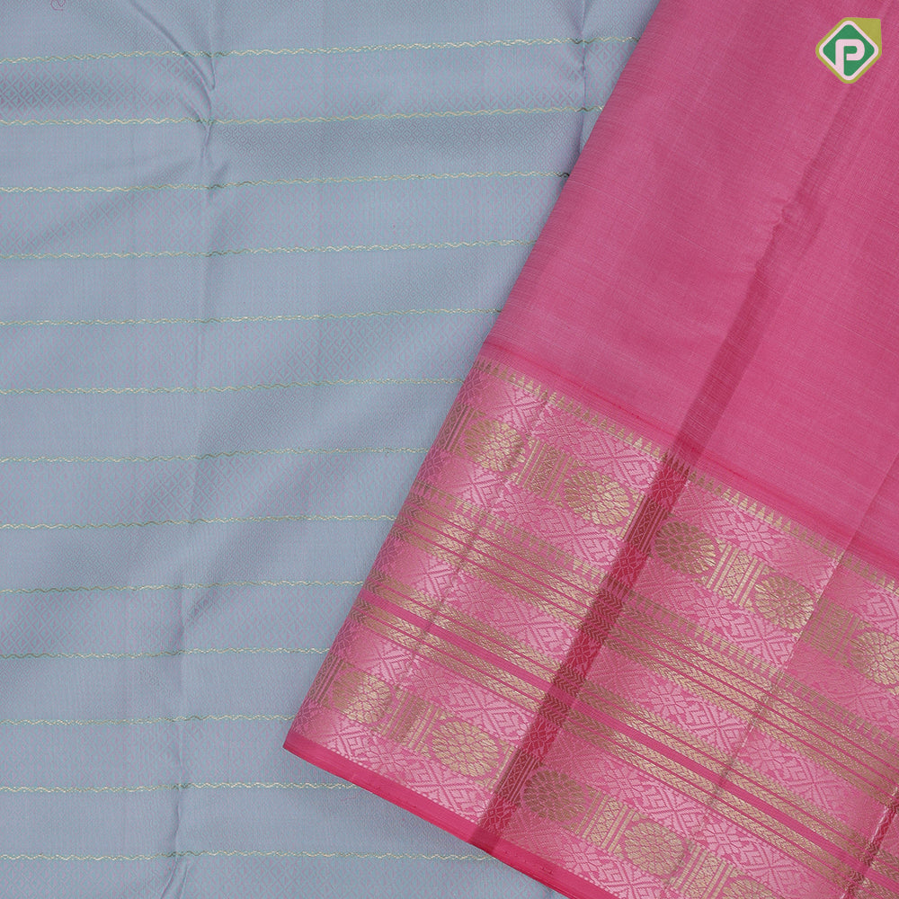 Smoke grey light pink self designed velthari design pink with gold zari and thread work lines border traditional vintage silk saree