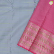 Smoke grey light pink self designed velthari design pink with gold zari and thread work lines border traditional vintage silk saree