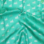 Rexsona Green Nandi Motif Silver Zari With Lavender Border Traditional Silk Saree