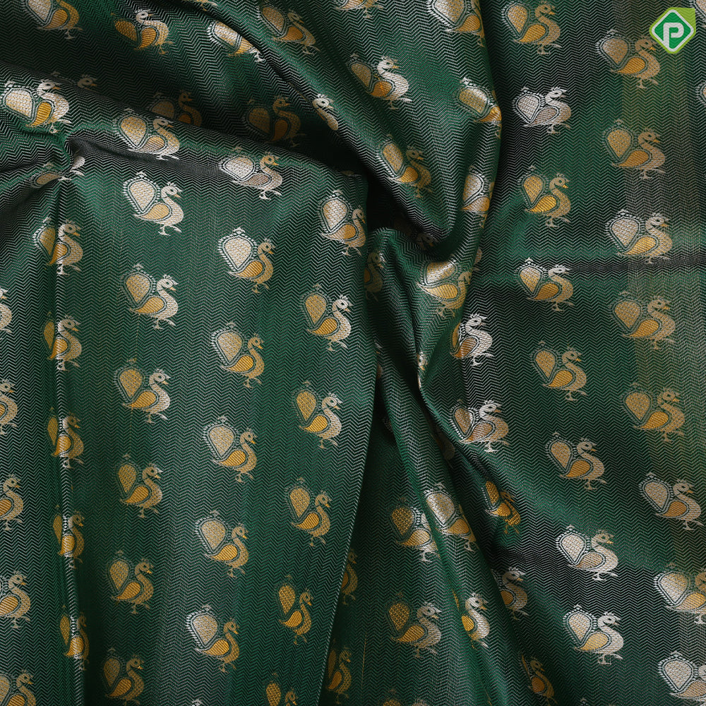 Pine Green peacock embossed butta design contrast mustard gold zari peacock butta border trendy silk saree