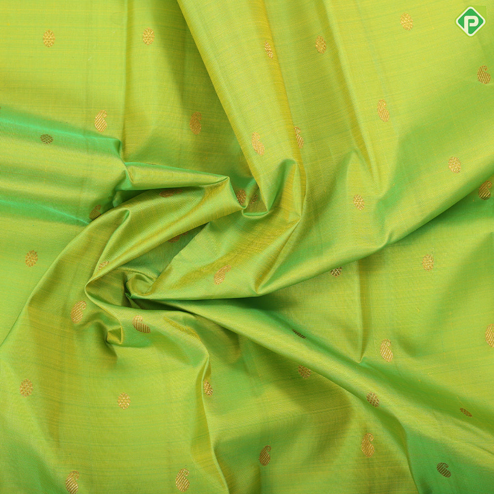 Lemon green gold zari mango butta design indigo blue with gold zari zig zag mid rettapet border traditional silk saree