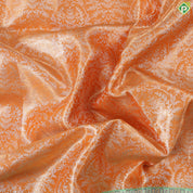 Honey orange silver zari floral creeper design contrast parrot green border grand bridal tissue silk saree