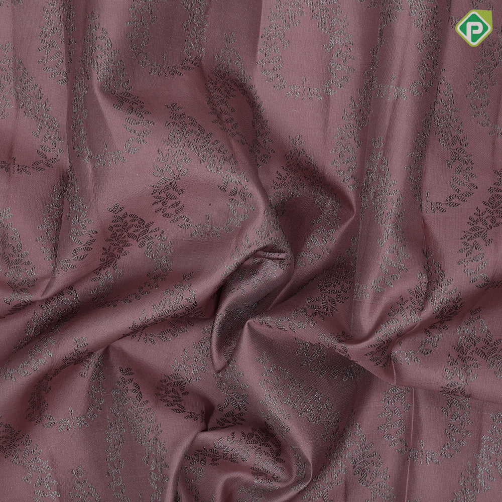 Peach onion with neem zari thilagam floral design self color border self weaves silk saree