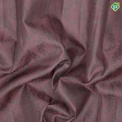 Peach onion with neem zari thilagam floral design self color border self weaves silk saree