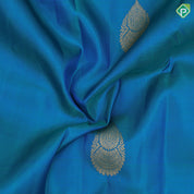 Peacock blue gold zari self designed thilagam butta self color gold zari edge border traditional silk saree