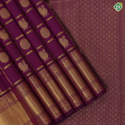 Magenta purple gold zari checks window panel butta design self gold zari peacock butta lines mid gap border traditional silk saree