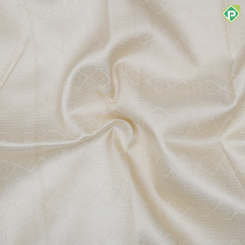 White silver zari small rangoli lines peach orange silver zari multi design border exclusive bridal silk saree