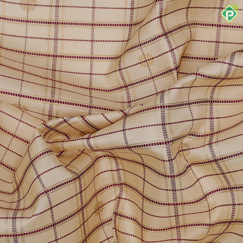 creamy sandal base maroon thread gold zari checks and butta maroon meena work border vintage traditional silk saree