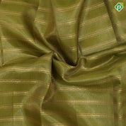 Mustard green gold zari rangoli lines design contrast syrup brown gold zari mango rangoli butta border traditional vintage silk saree