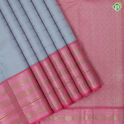 Smoke grey light pink self designed velthari design pink with gold zari and thread work lines border traditional vintage silk saree