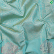Sea green gold zari grand floral tissue weaved design self meena work floral border trendy tissue silk saree