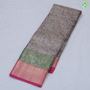 Pista green silver zari and multi color floral design contrast double color center border tissue art silk saree