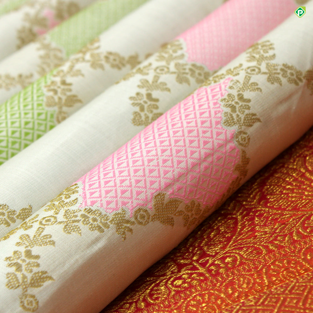Cream White With Orangish Pink Floral Work Grand Bridal Silks Saree