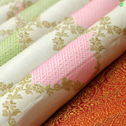 Cream White With Orangish Pink Floral Work Grand Bridal Silks Saree