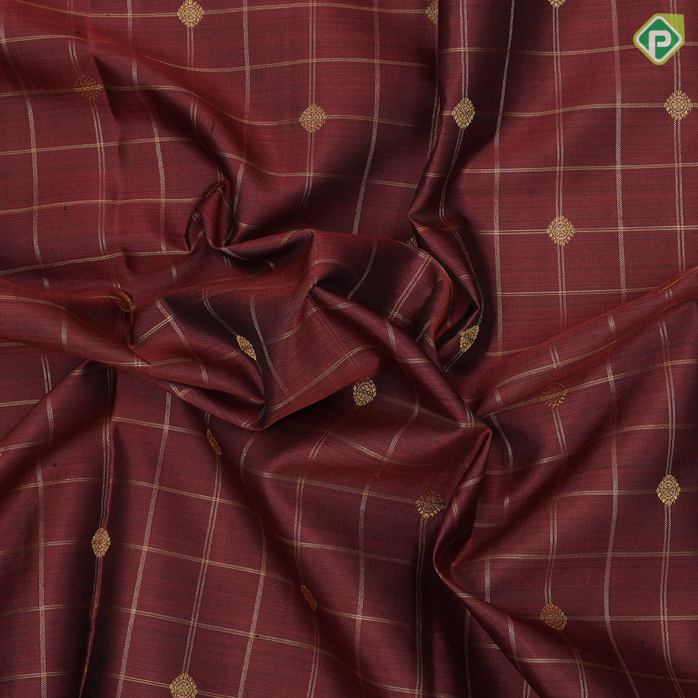 Rust color gold zari checks with rudraksham butta berry blue gold zari peacock edge border traditional silk saree