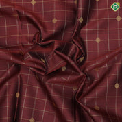 Rust color gold zari checks with rudraksham butta berry blue gold zari peacock edge border traditional silk saree
