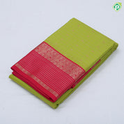 Parrot green gold zari checks and kamalam butta rani pink gold zari border art silk saree