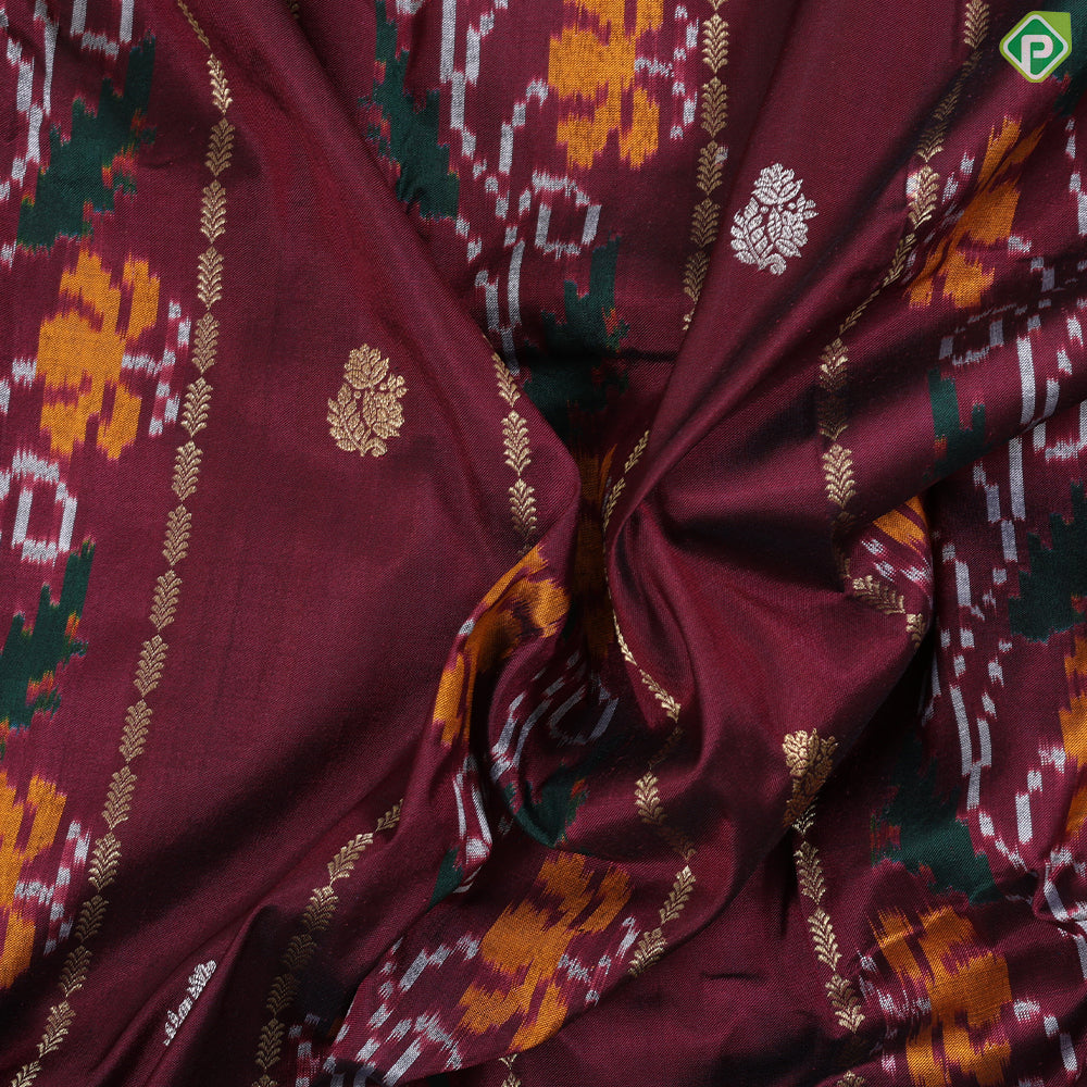 Wine maroon gold zari stripes ikkat design contrast kelly green silver gold zari flower butta border ikkat silk saree