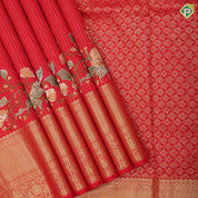 Chilly red silver gold zari stipes and four side floral embroidered self silver gold zari zig zag line border embroidery silk saree