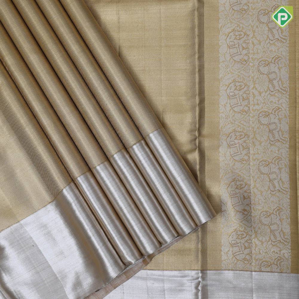 gold base zari by zari tissue plain shimmer design contrast silver zari plain shimmer border Grand bridal tissue silk saree