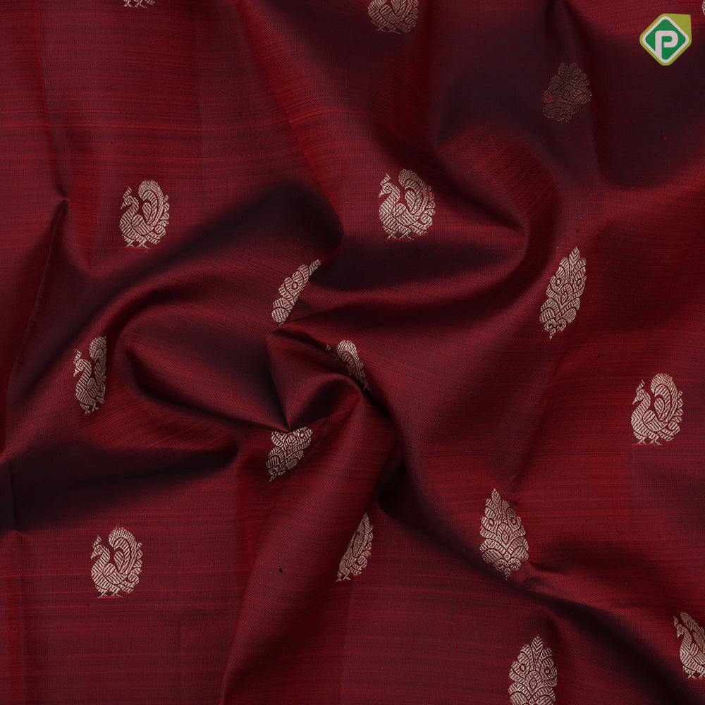 Maroon gold zari peacock fancy leaf butta design sandal gold zari rangoli design border traditional silk saree