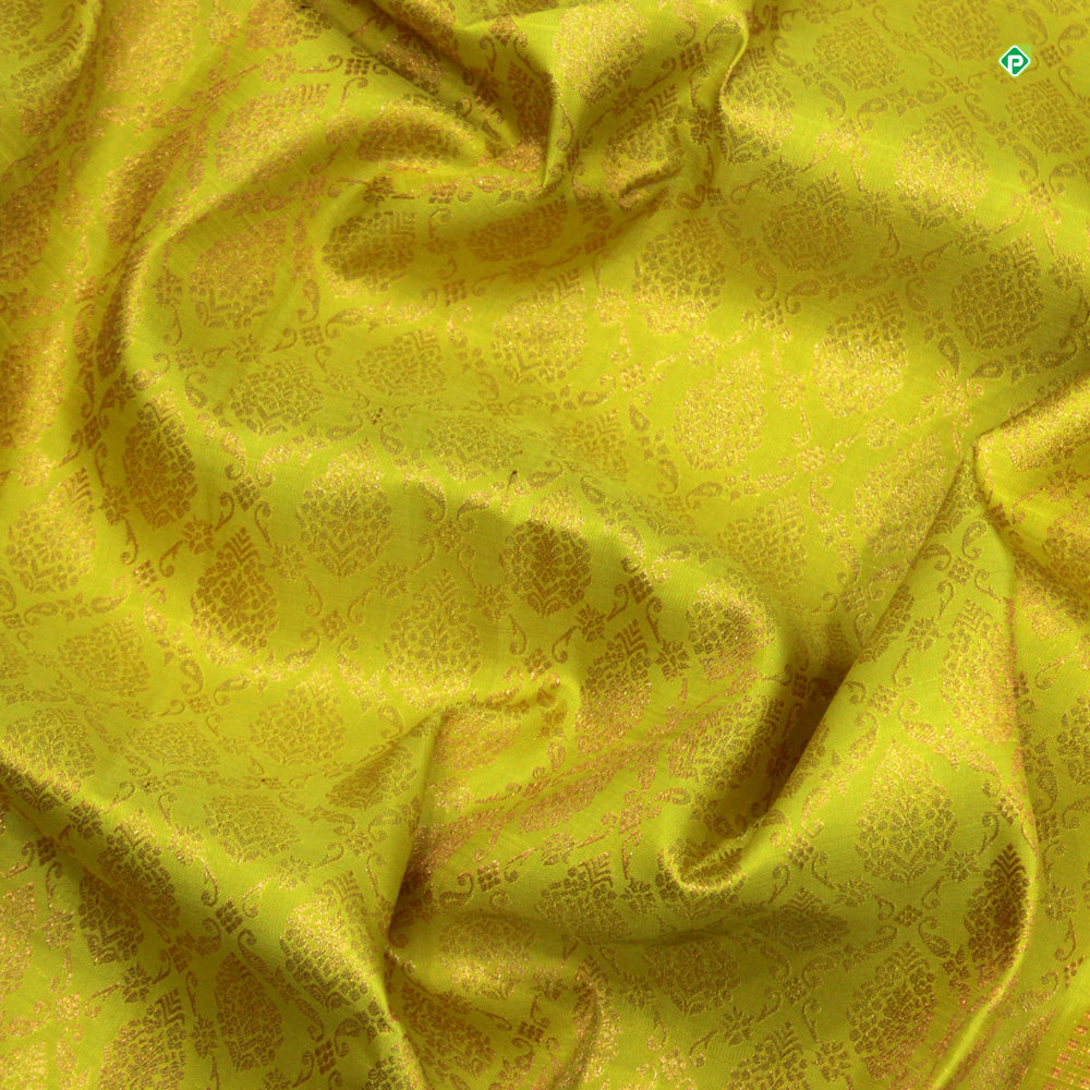 Lime Green Colour Small Thilagam Fancy Floral Motifs Grand Bridal Silks Saree