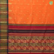 Dark orange gold zari fancy flower butta green red gold zari big diamond design one side border silk saree