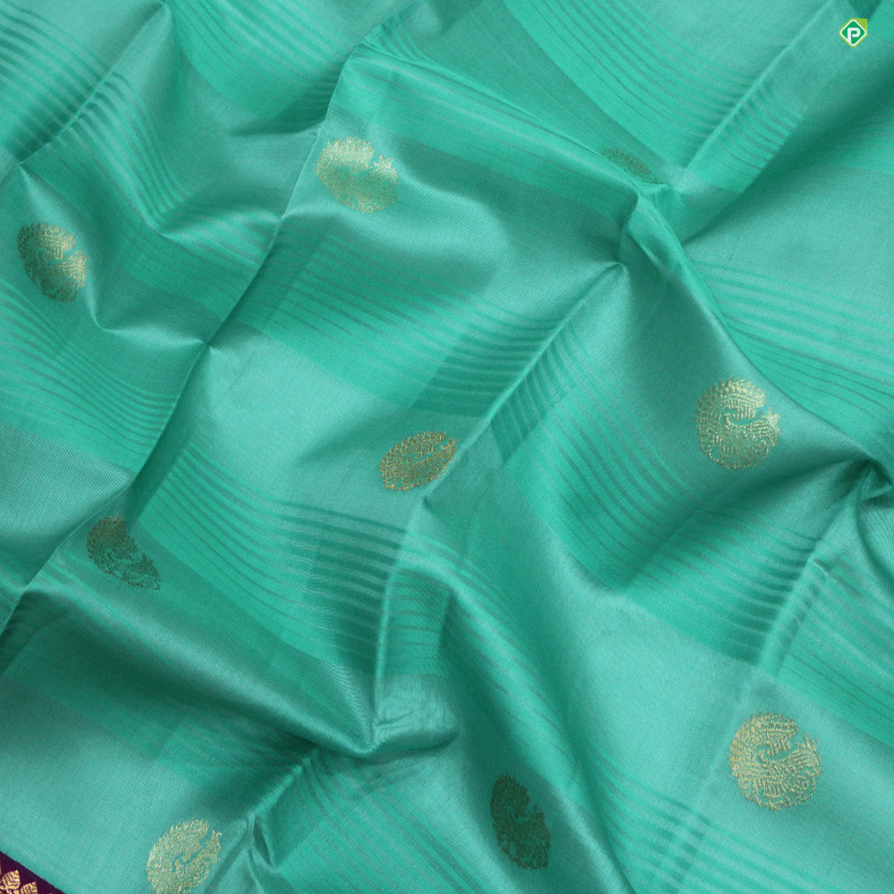 Sea Green With Peacock Motifs Pink Embossed Mango And Button Zari Border Pure Linen Silk Saree