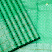 Pista Green Silver Zari Weaved Four Line Rudraksham Border Traditional Silk Saree