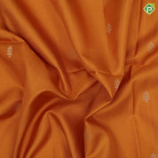 Mustard yellow gold zari fancy butta design grand pallu rani pink gold zari temple border soft silk saree
