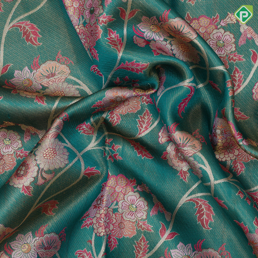 Forest green gold zari floral creeper design baby pink silver gold zari double peacock arch design meena work tissue silk saree