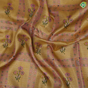 golden yellow with light pink flower bunch in frame design pink gold zari elephant and floral butta border tissue silk saree
