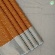 Mustard yellow gold zari checked window panel design mint green gold zari mango butta border art silk saree
