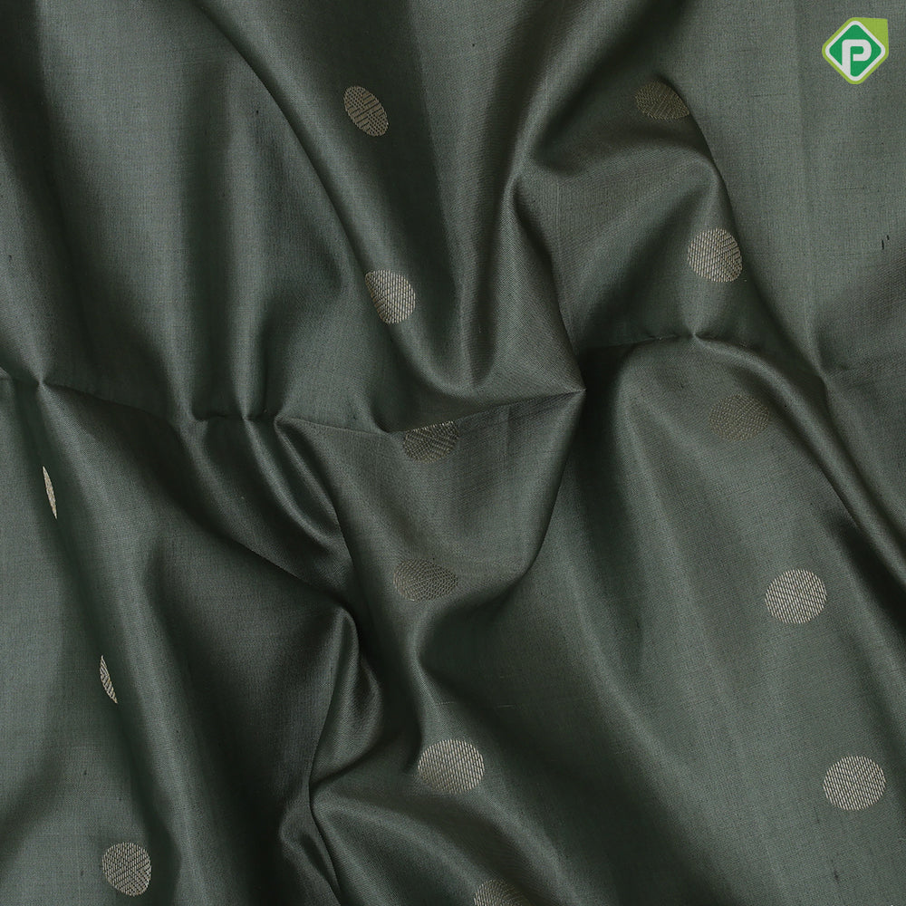 Tea green gold zari chakkaram butta motifs olive green rangoli multi color lines mid gold zari border soft silk saree