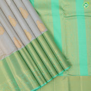 creamy sandal silver gold zari double peacock butta rexona green gold zari High border traditional silk saree