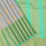 creamy sandal silver gold zari double peacock butta rexona green gold zari High border traditional silk saree