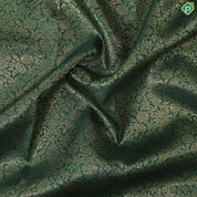 Dark green with gold zari grand floral design contrast maroon red gold zari border grand brocade bridal silk saree