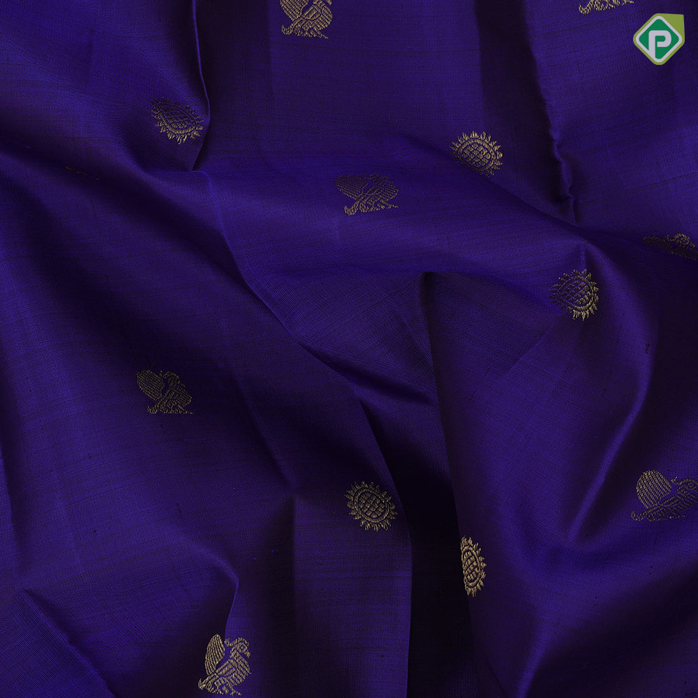 Indigo blue gold zari rudraksham annam butta motifs contrast green gold zari retta pett border traditional silk saree