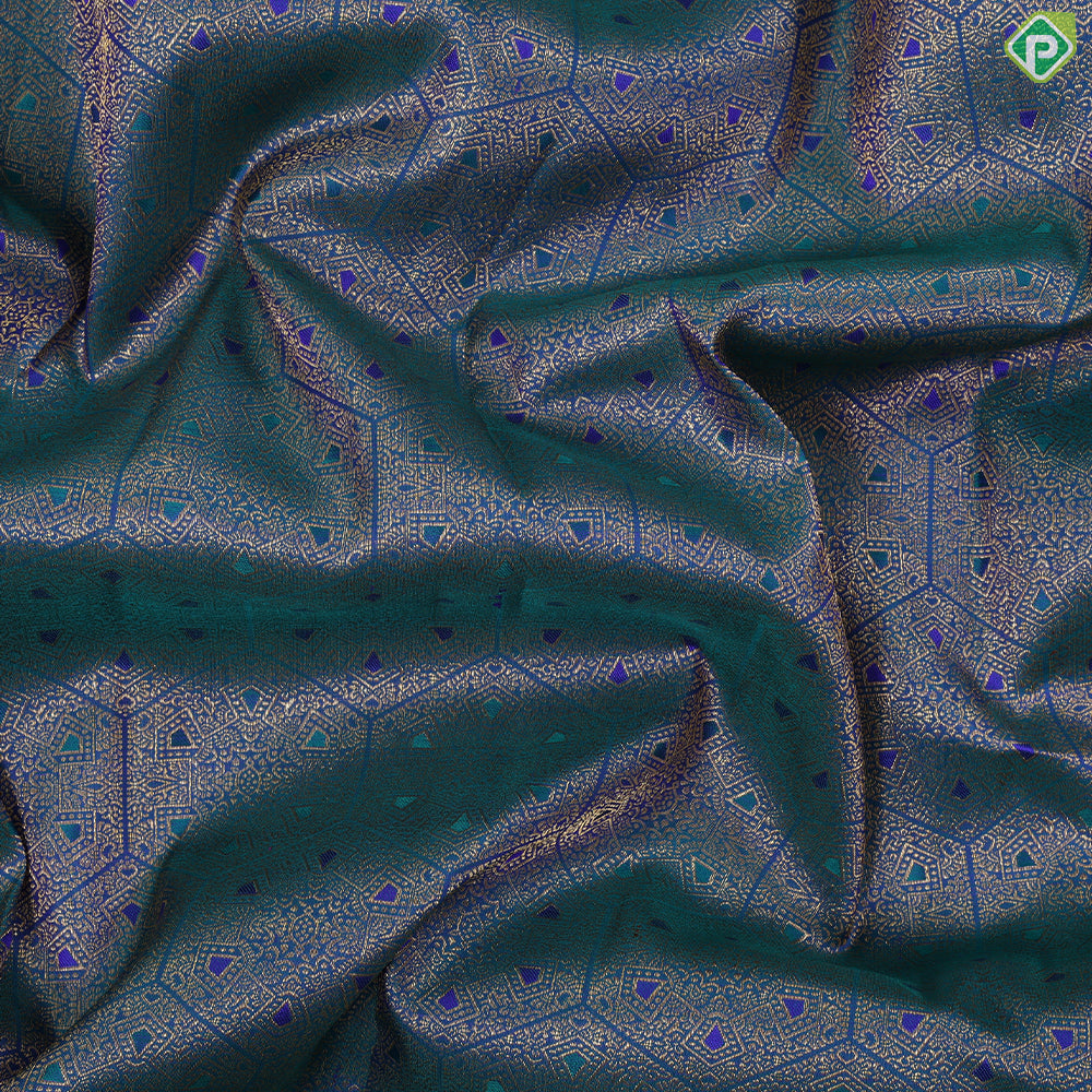 Peacock green gold zari meena work self brocade and gold zari diamond bentex border grand bridal silk saree