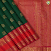 Bottle green gold zari arch and double peacock butta red gold zari elephant and arch retta pett border silk saree