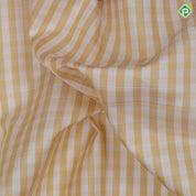Cream with beige checks body design maroon gold zari butta high three part border concept vintage silk saree