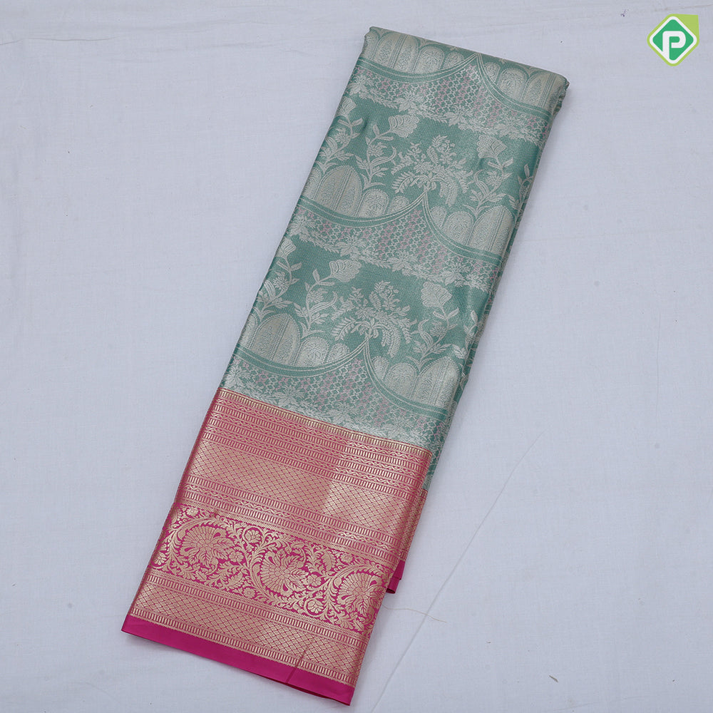 Pink silver zari fancy flower and arch design rama green gold zari rangoli border tissue art silk saree