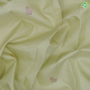 Pista green rose gold neem zari fancy flower butta motifs self tuning floral border trendy designer silk saree