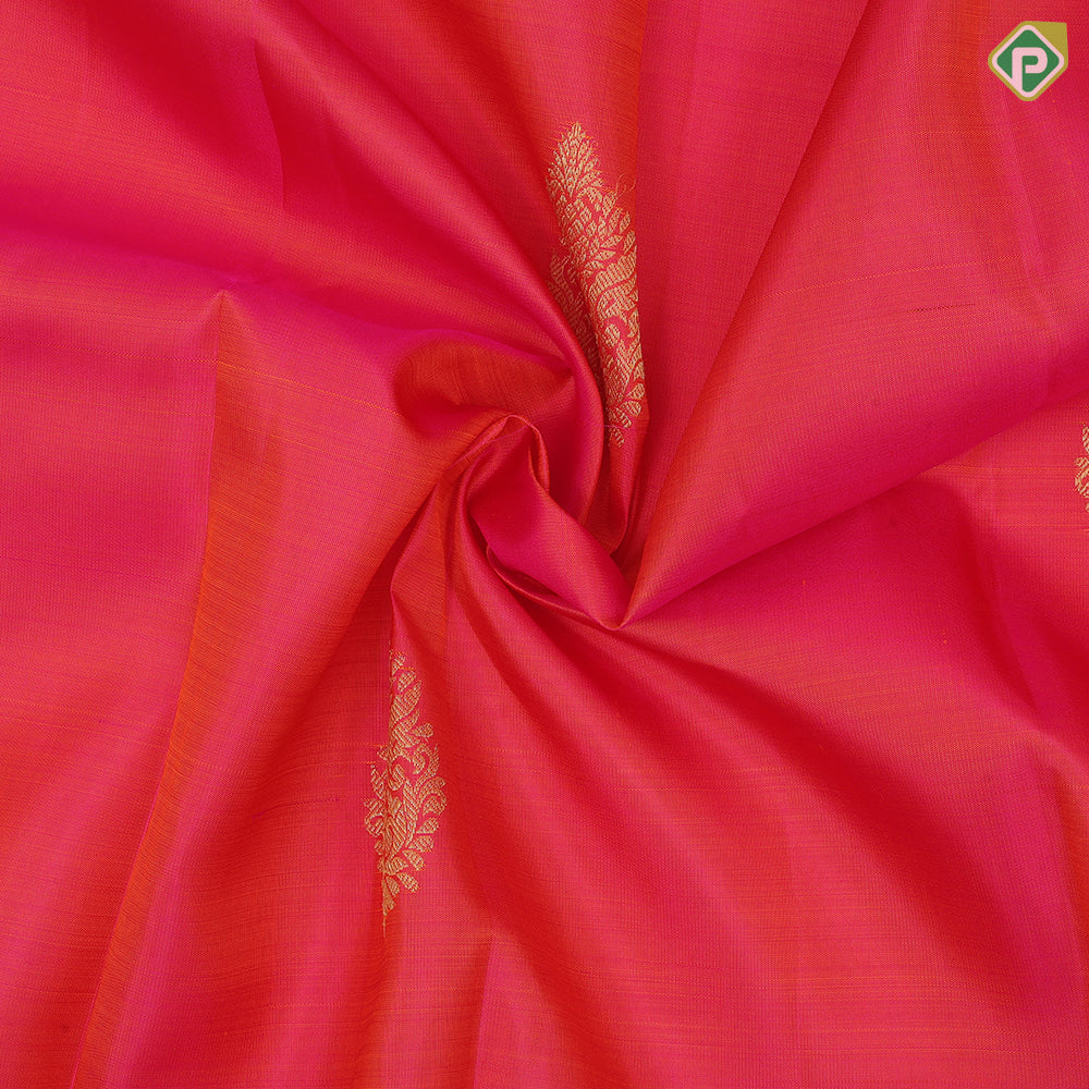 Bottle green gold zari fancy thilagam butta design self color gold zari peacock elephant butts edge border traditional silk saree