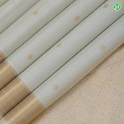 Milk white gold zari flower and coin butta design self gold zari bavanji border traditional silk saree