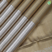 gold base zari by zari tissue plain shimmer design contrast silver zari plain shimmer border Grand bridal tissue silk saree