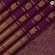 Magenta purple gold zari checks window panel butta design self gold zari peacock butta lines mid gap border traditional silk saree