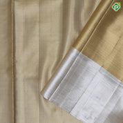 gold base zari by zari tissue plain shimmer design contrast silver zari plain shimmer border Grand bridal tissue silk saree